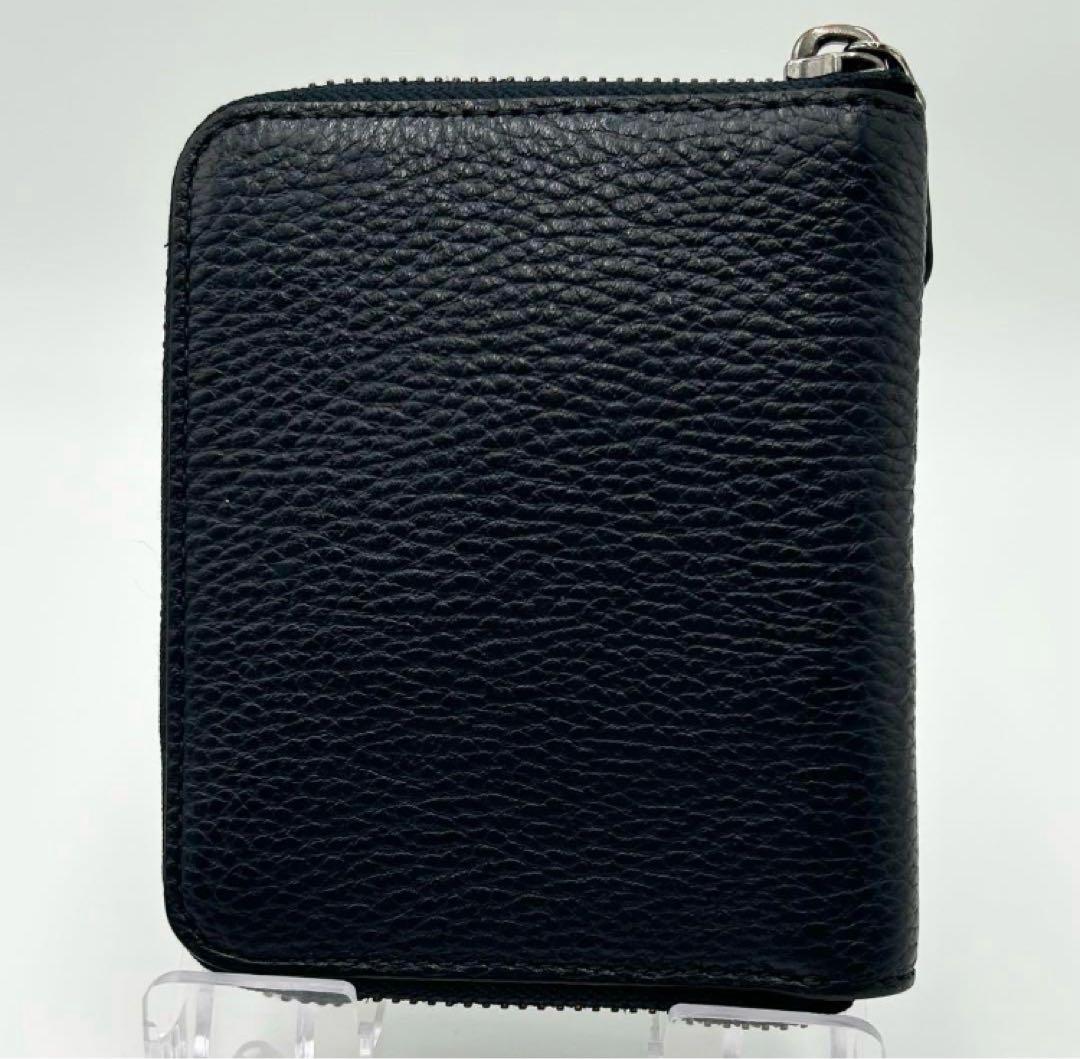 coach コーチ　二つ折り財布　ラウンドファスナー　ロゴ型押し　レザー　シボ革