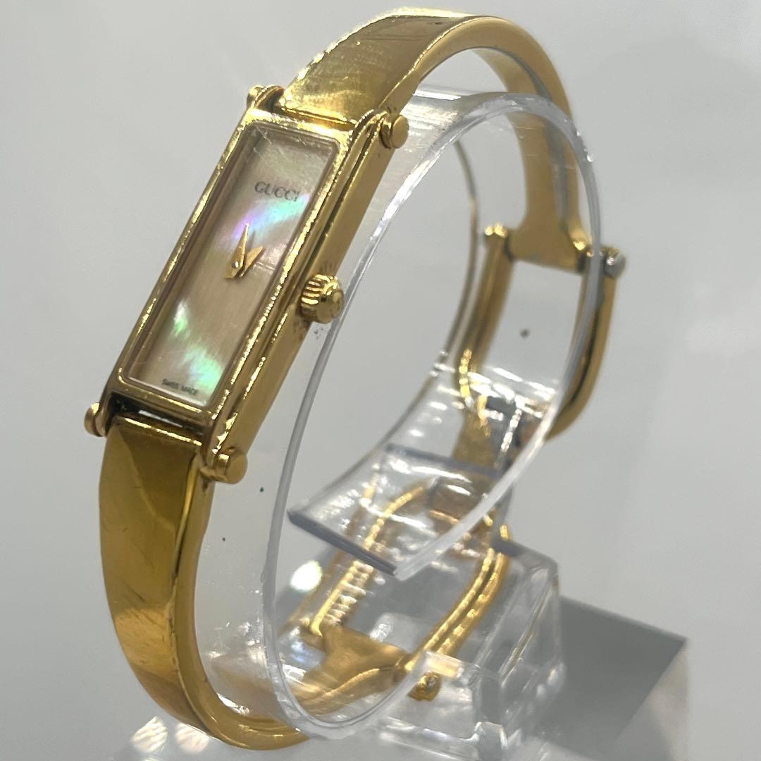 稼動 GUCCI シェル文字盤 1500L バングル ゴールド QZ 腕時計