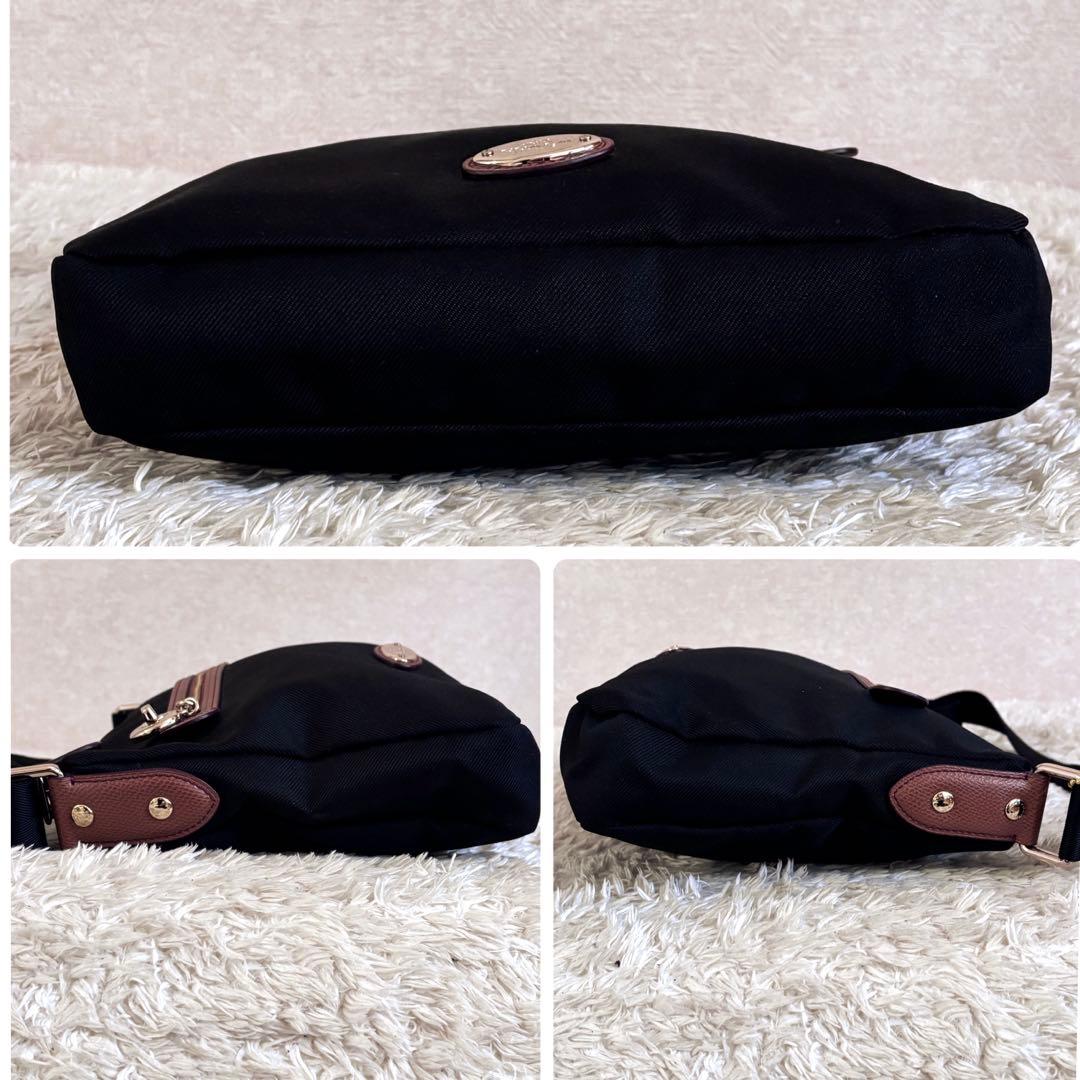 新品同様✨コーチ ショルダーバッグ ブラック ターンロック チャーム 男女兼用