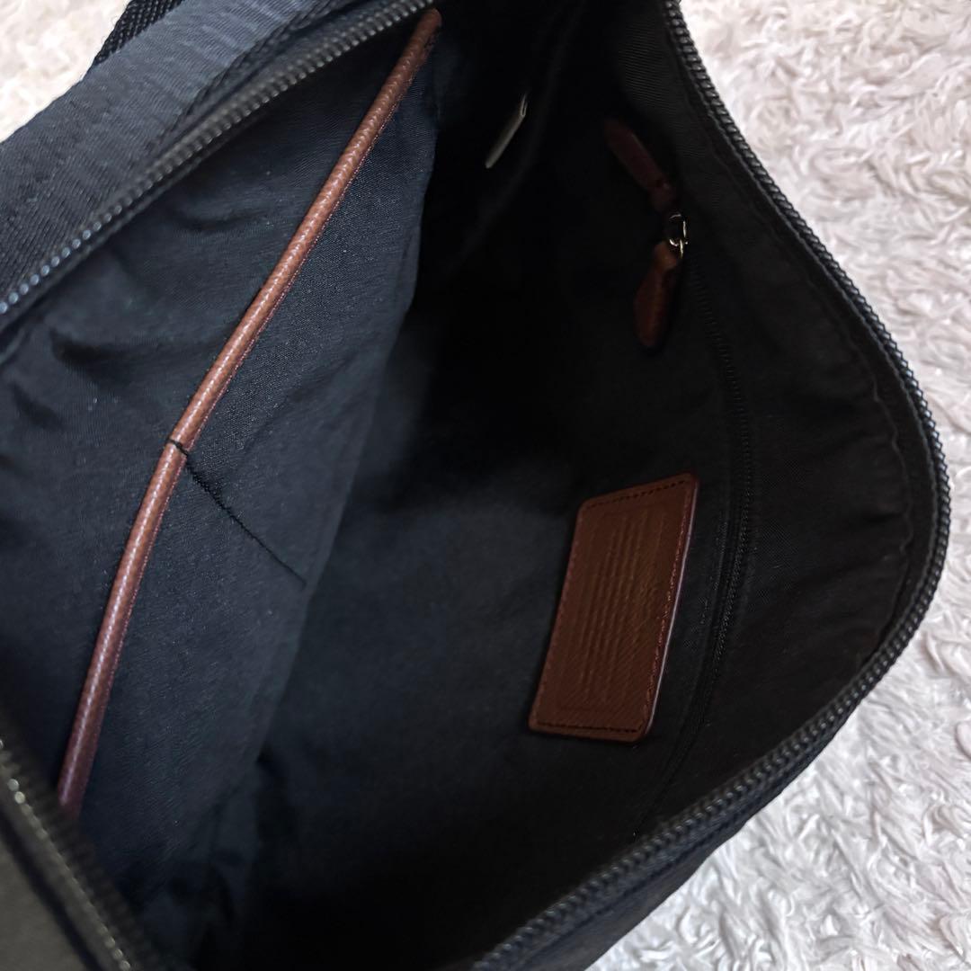 新品同様✨コーチ ショルダーバッグ ブラック ターンロック チャーム 男女兼用