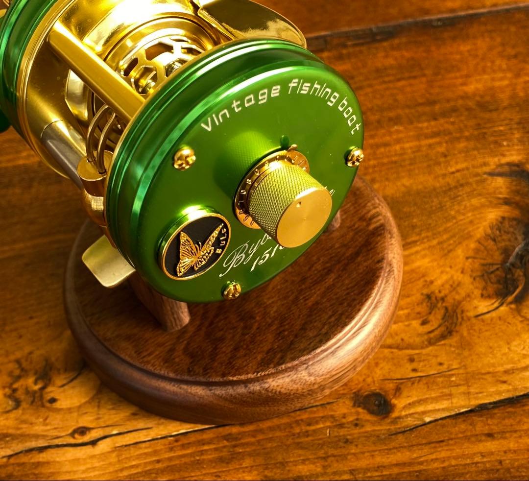 新品未使用　トラウト　ベイトリール　丸型　リール　グリーン×ゴールド　渓流釣り