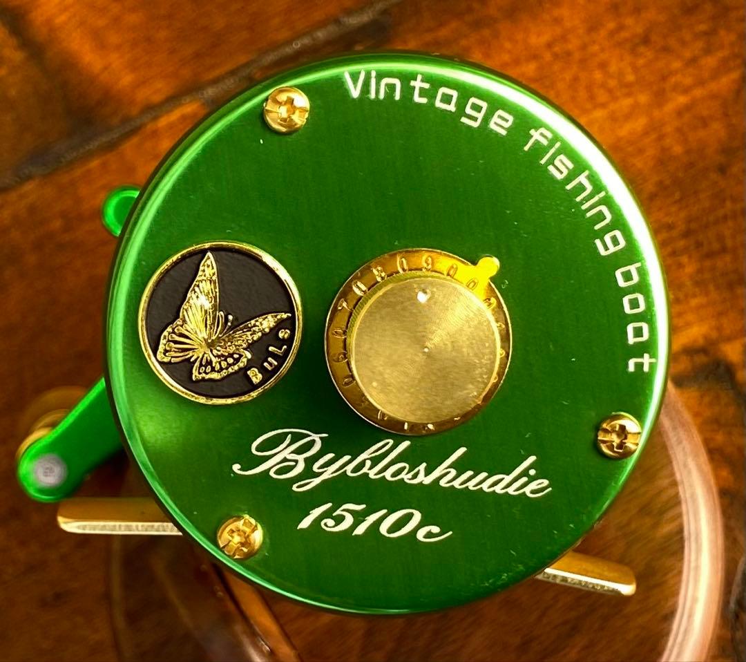 新品未使用　トラウト　ベイトリール　丸型　リール　グリーン×ゴールド　渓流釣り