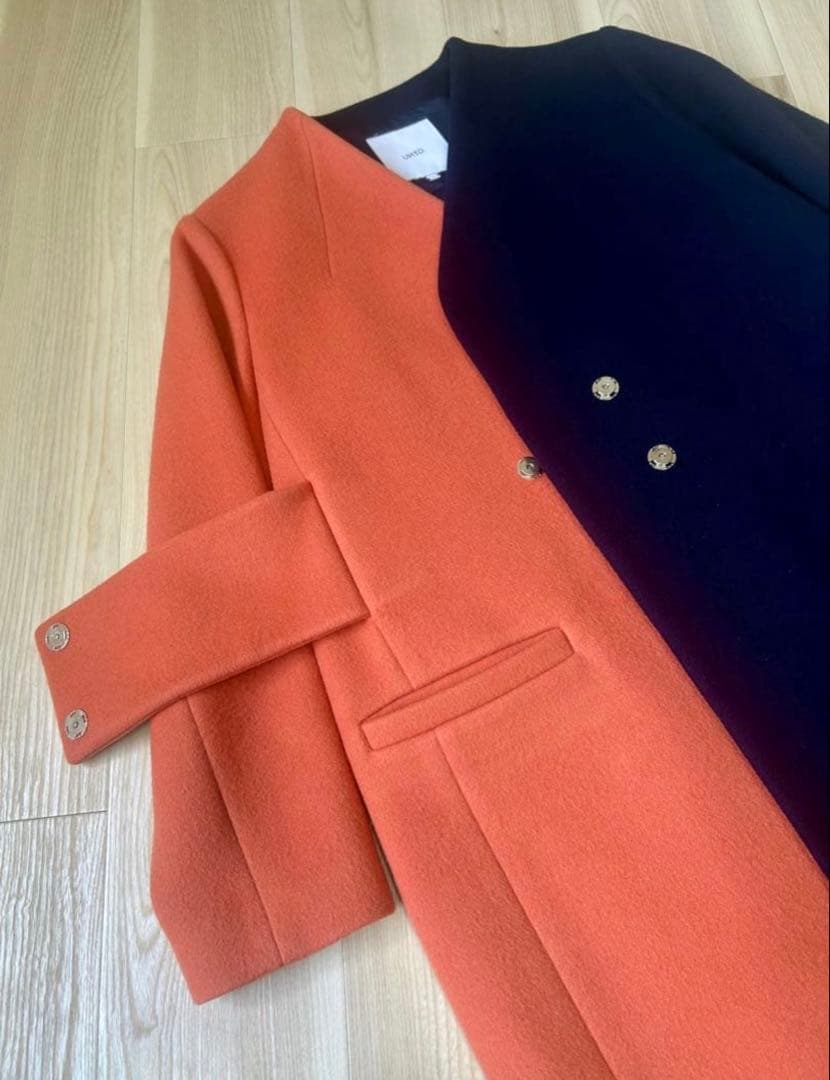 UN3D. アンスリード バイカラーアシンメトリーコート オレンジ×ネイビー