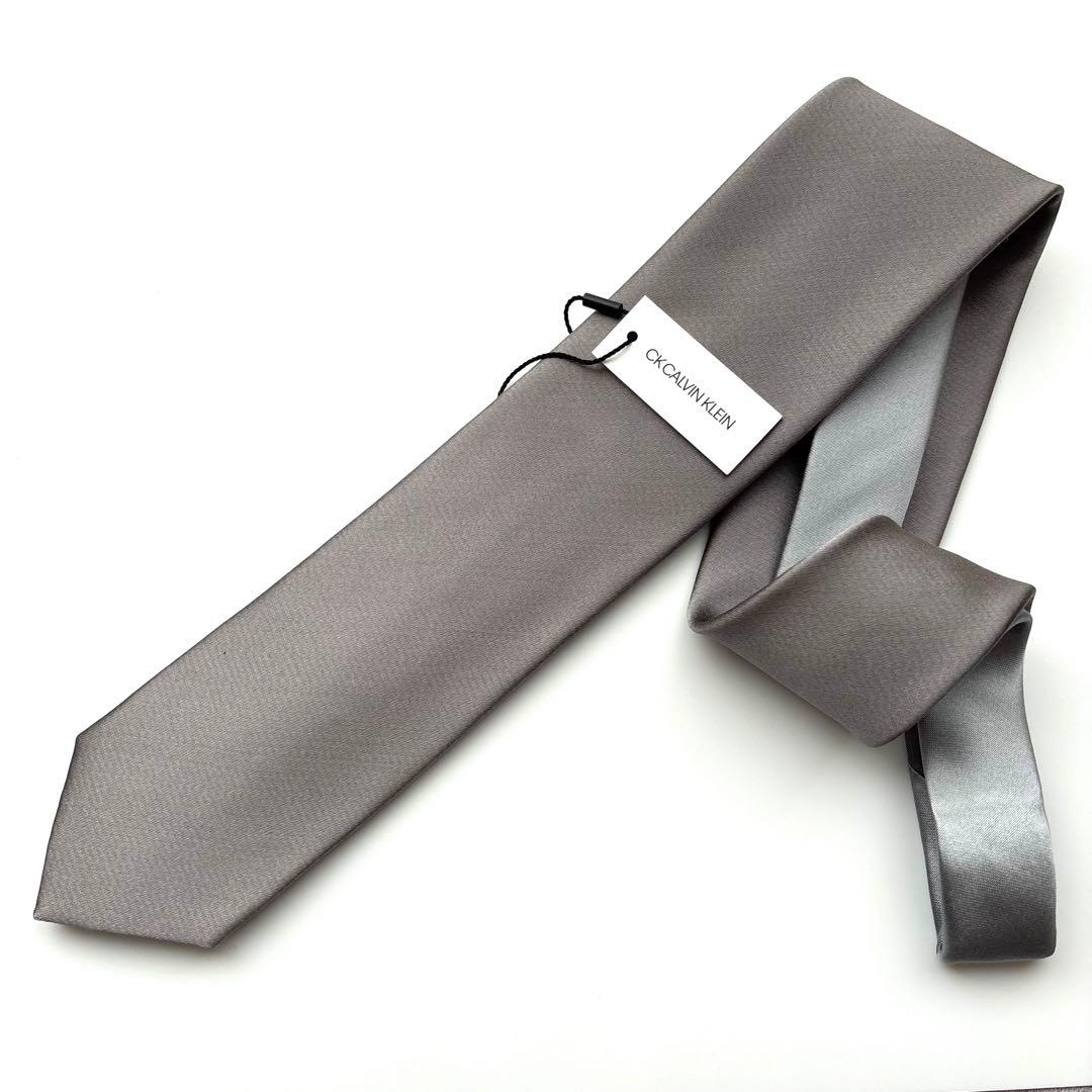 ꧁新品未使用꧂ カルバンクライン ネクタイ ナロータイ 無地 シルバー 結婚式