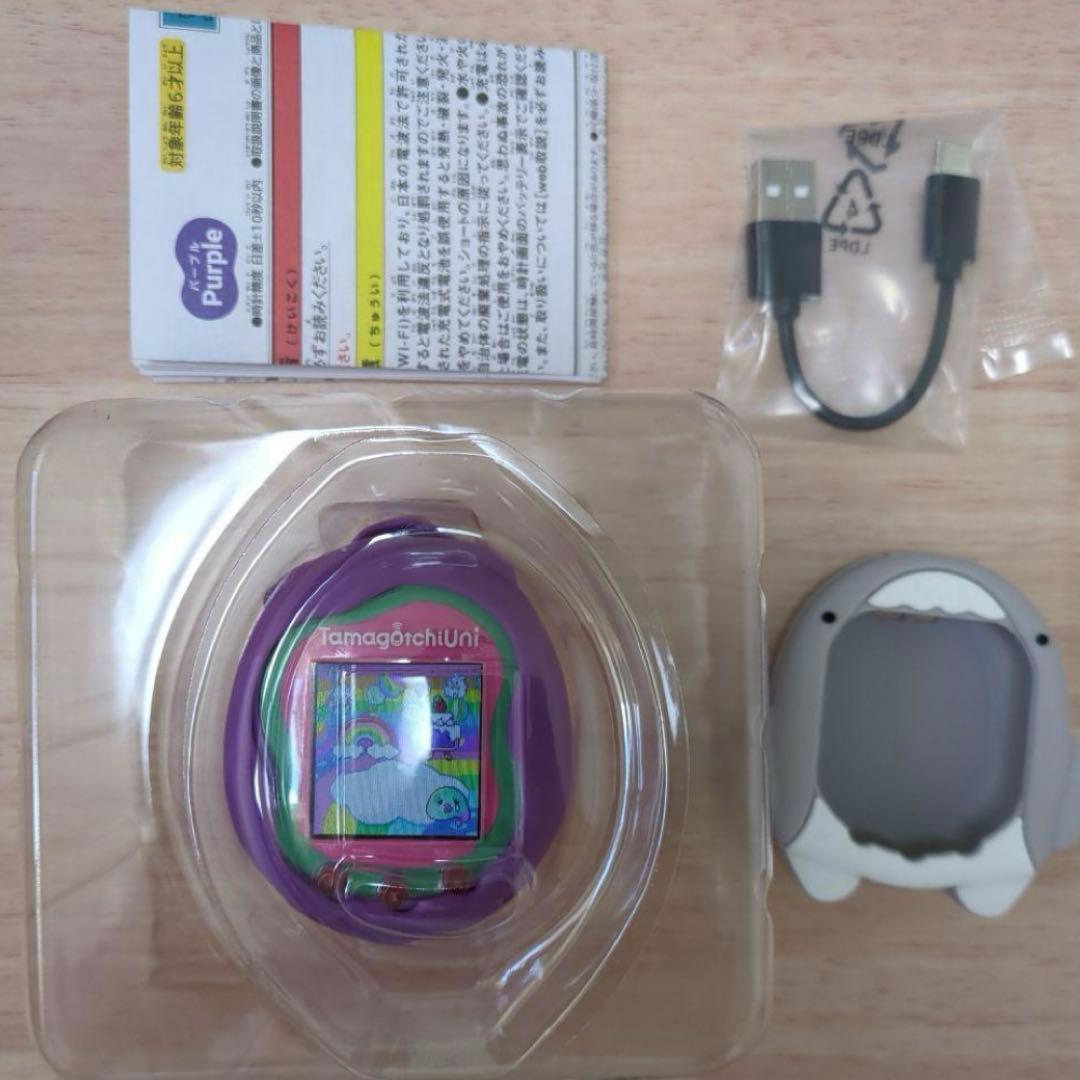 美品　たまごっちユニ　パープル　シリコンカバー ガイドブック付
