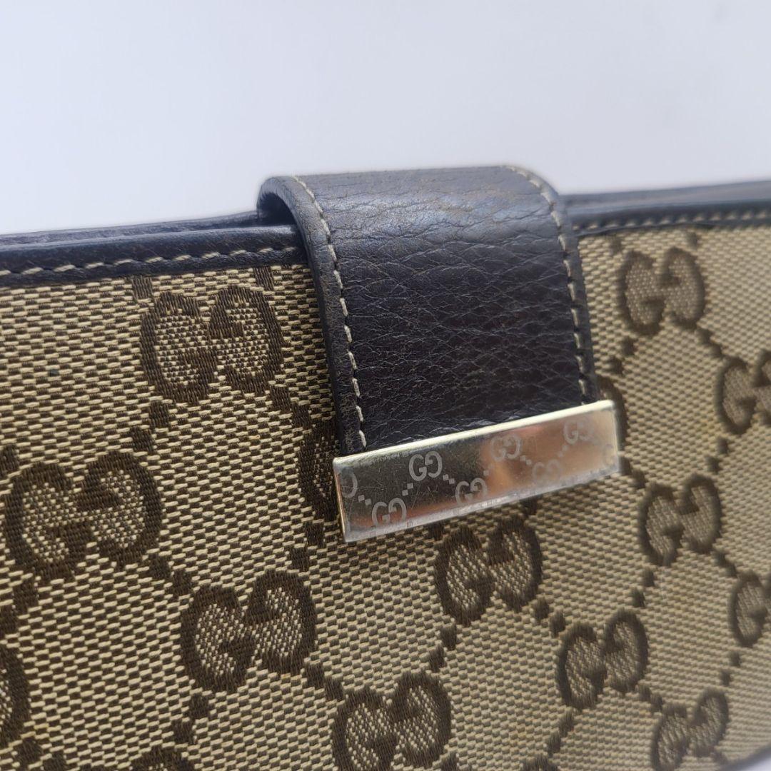 GUCCI GGキャンバス 長財布 ブラウン レザー 金具付き 定番人気