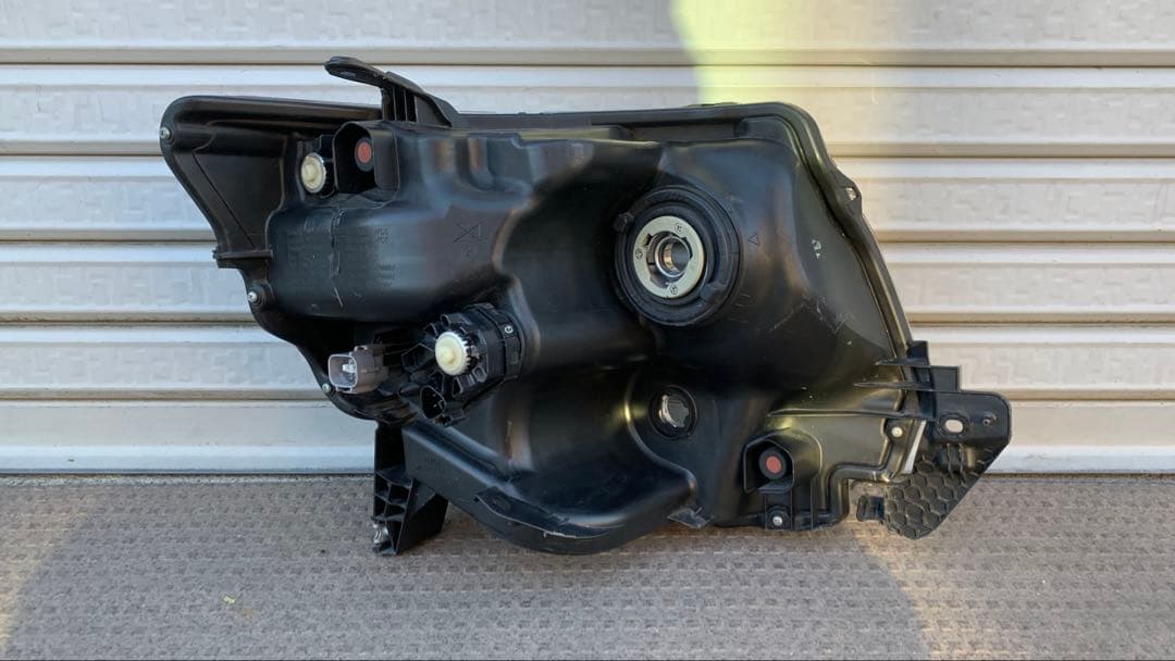 タントカスタム　左ヘッドライト　LA600S