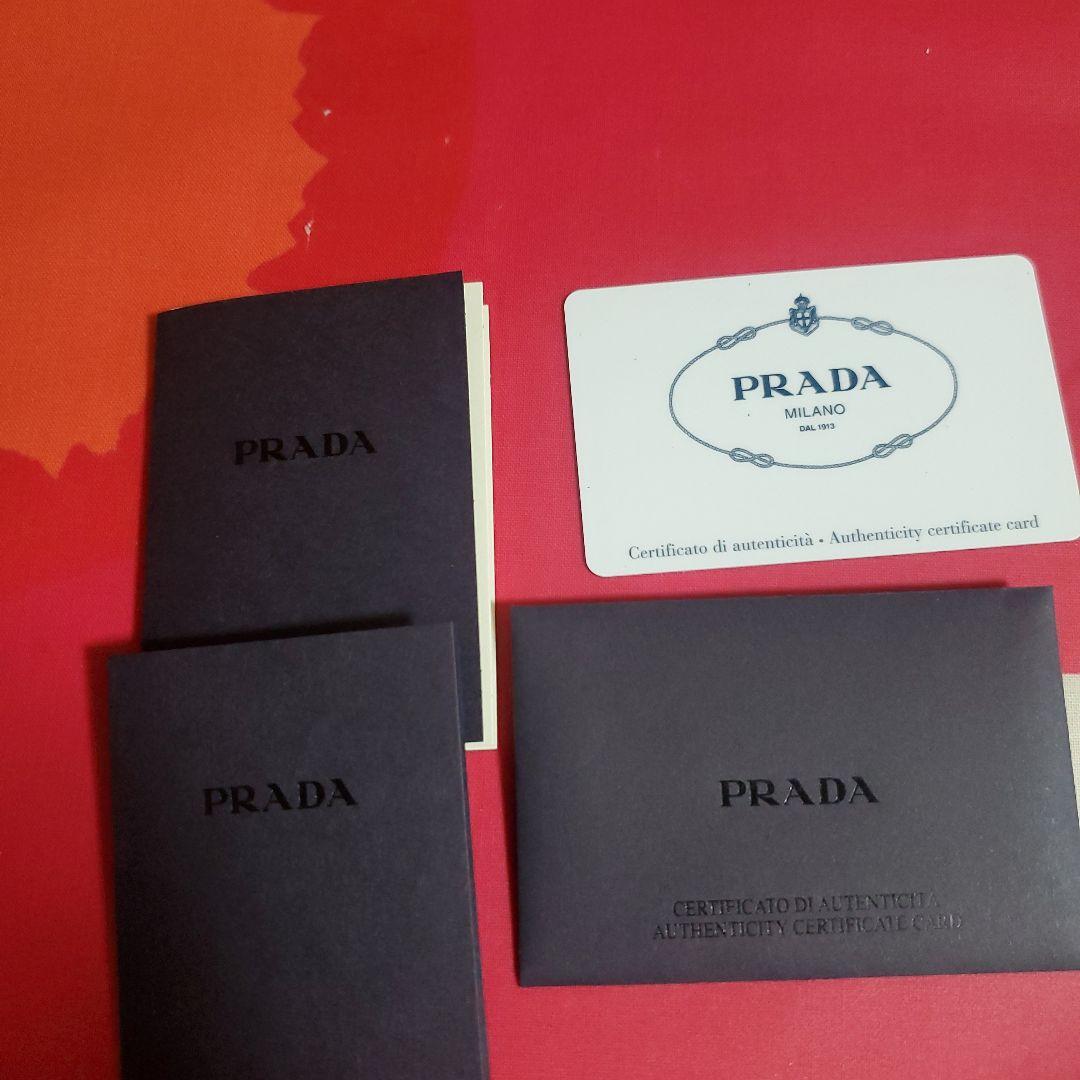 PRADA　二つ折り財布　サフィアーノレザー黒バイカラー