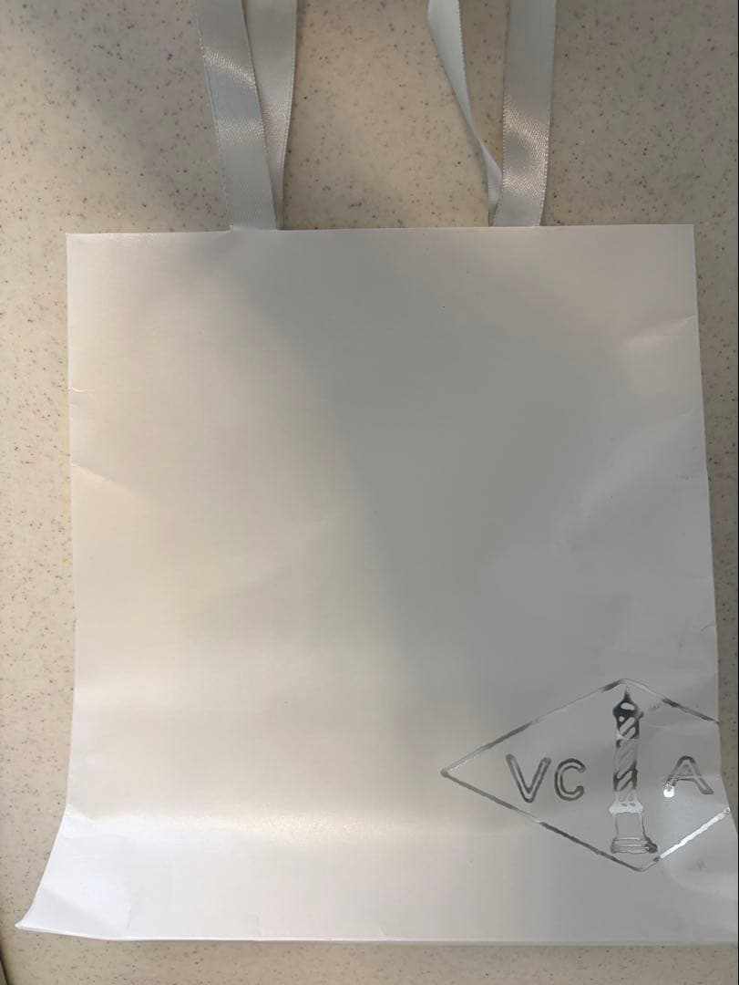 ゴールド アナログ腕時計 エメラルド装飾