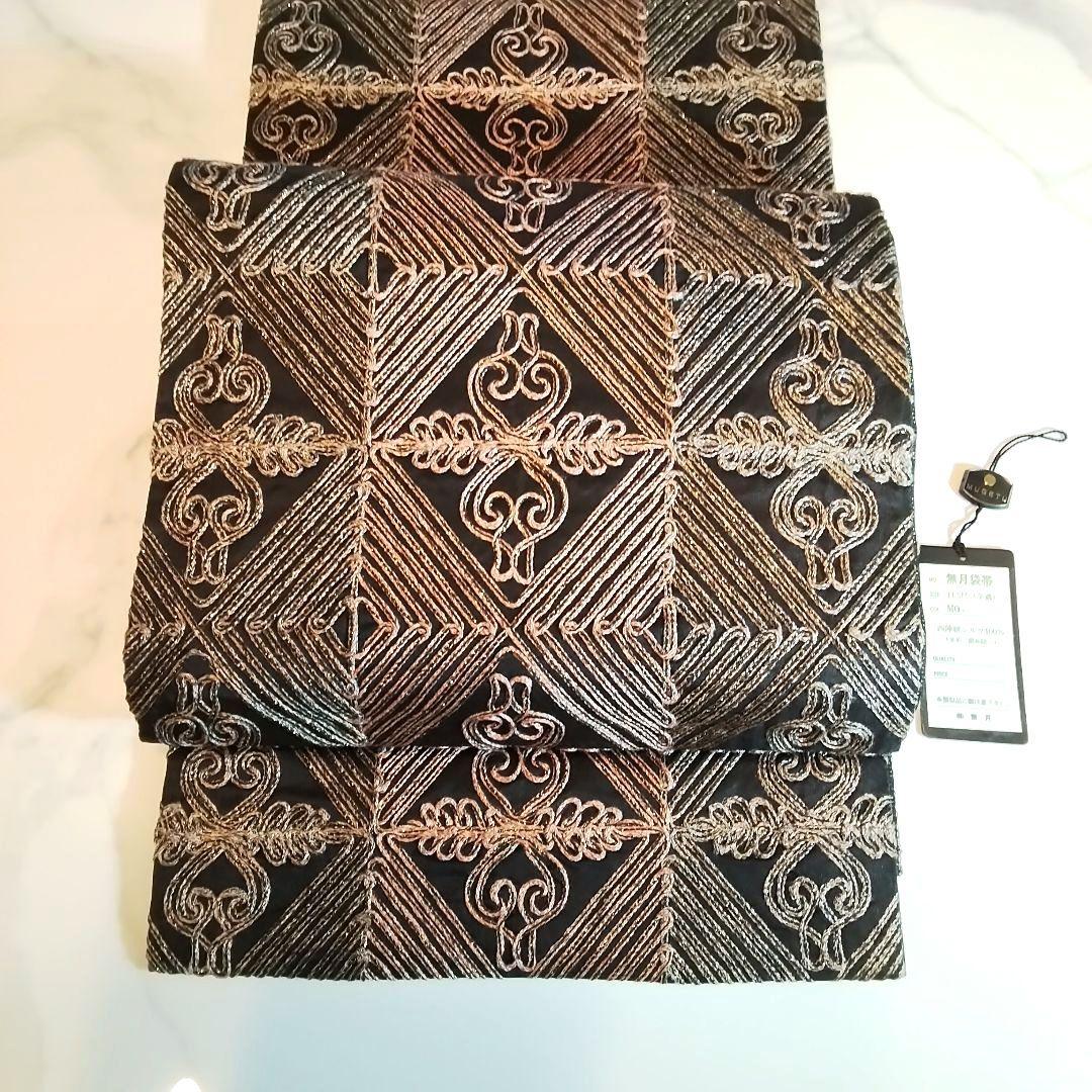 無月袋帯　全通柄　西陣絣シルク100%　無月タグ付き　美品