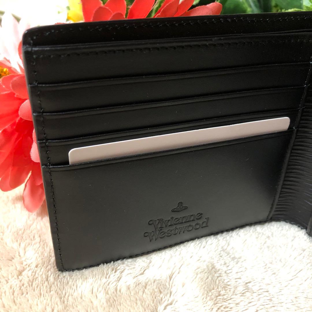 t.11010347.s　未使用　ヴィヴィアンウエストウッド　フロウ折財布