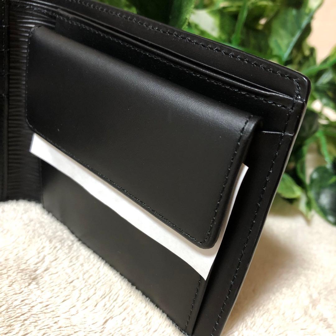 t.11010347.s　未使用　ヴィヴィアンウエストウッド　フロウ折財布