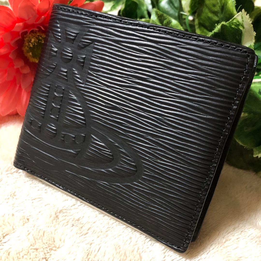 t.11010347.s　未使用　ヴィヴィアンウエストウッド　フロウ折財布