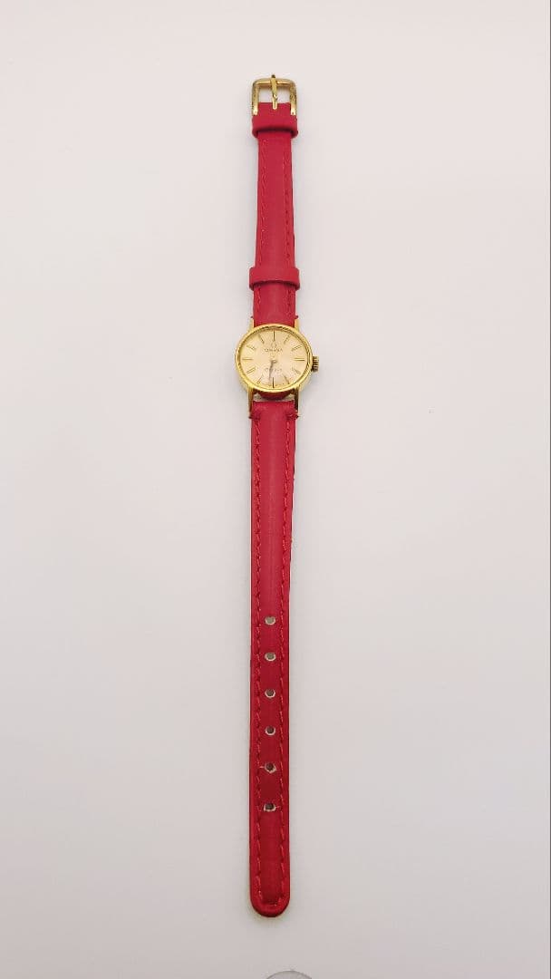 m*o様 年末限定。レディース　OMEGA オメガ　ゴールド/レッド 手巻き時計
