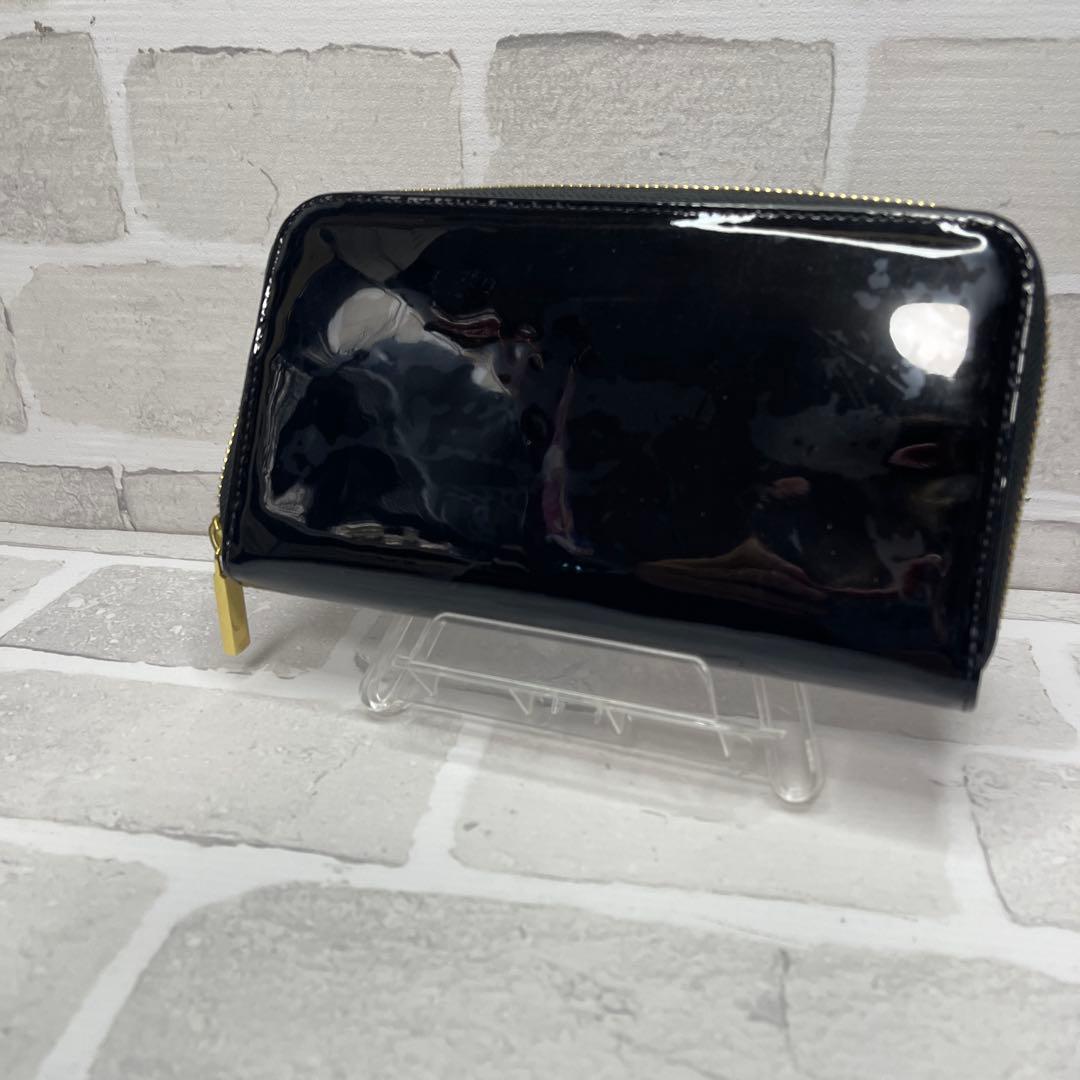 (未使用品)大人気、トリーバーチ、長財布、ラウンドジップ、エナメル地、デカロゴ