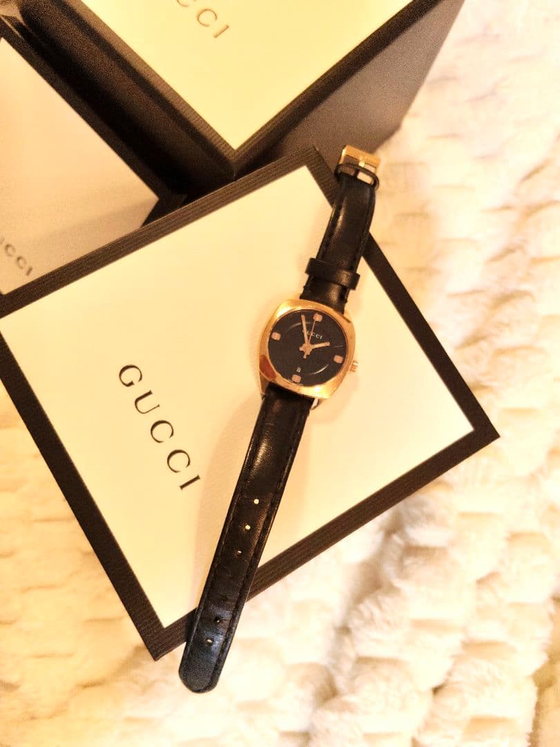 GUCCI レディース時計 ゴールド✕ブラックレザー