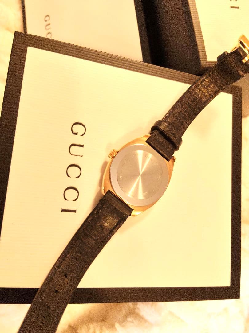 GUCCI レディース時計 ゴールド✕ブラックレザー