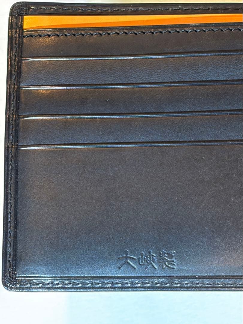 名人級　大峡製鞄　イタリア製牛革二つ折り財布（黒）