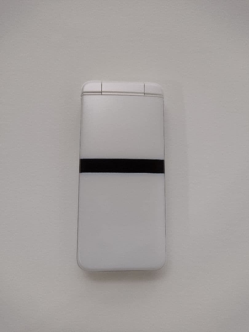 DINGOケータイ KY-42C 本体 白 ドコモ