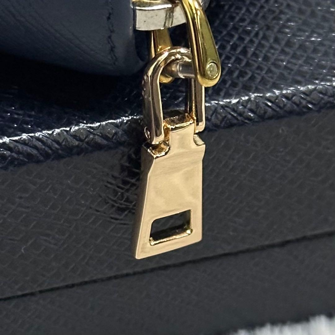 PRADA プラダ　長財布　ラウンドジップ　リボン　ブルー　ゴールドロゴ
