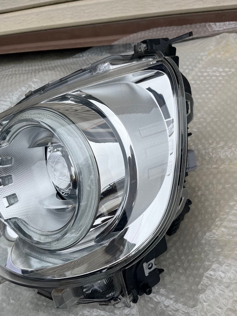 LA800S ムーヴキャンバス　ヘッドライト　左