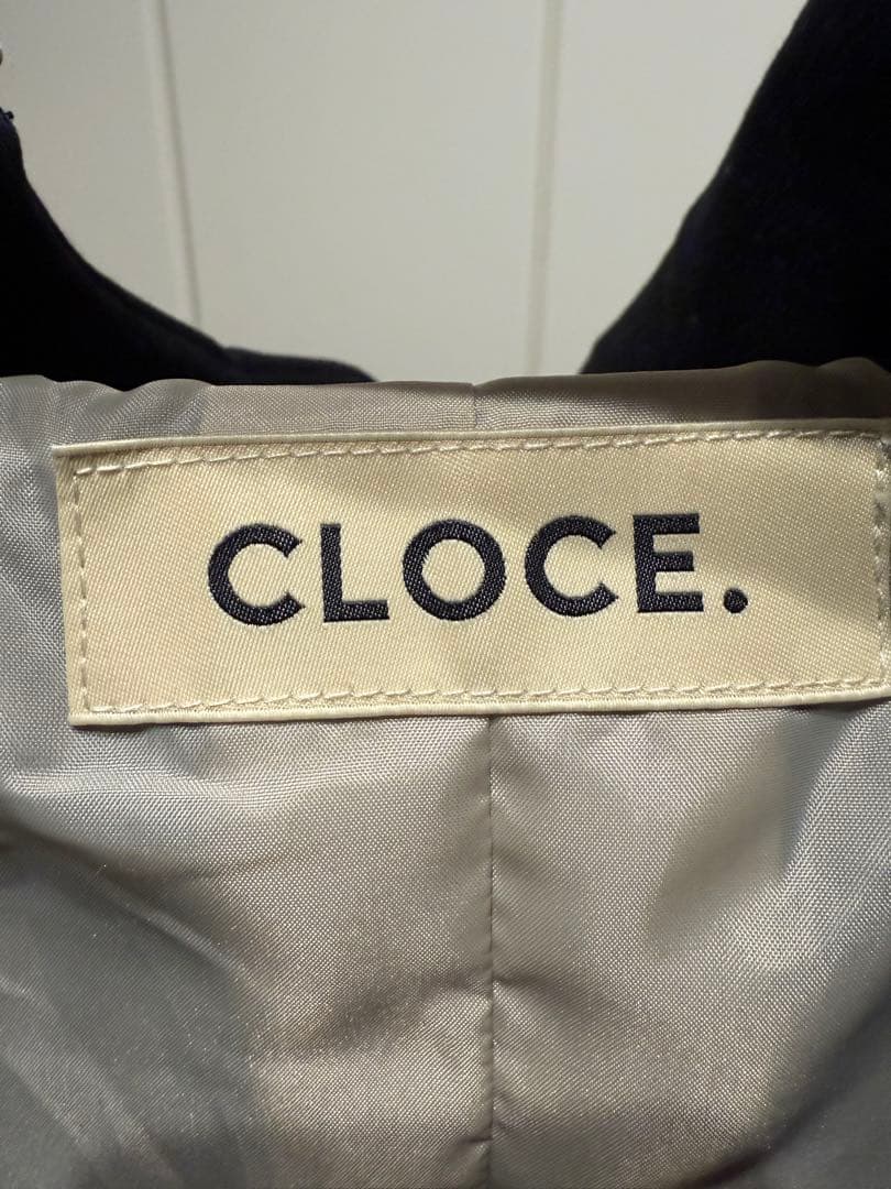 ユコユコ マストバイ バイカラーダウンベスト