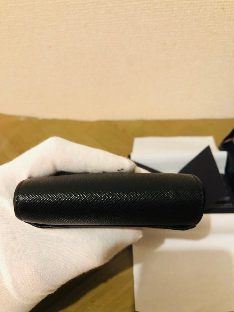 PRADA 三つ折り財布 サフィアーノ 三角ロゴ レザー 黒(ICチップ搭載)