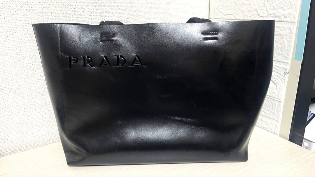 めりープラダ トートバッグ カットワーク ロゴ 肩掛け A4可 黒