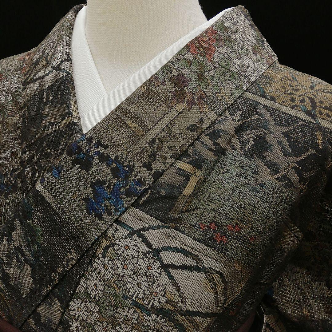 本場大島紬(袷)　(四季の草花紋様　恵 積五郎(絣の魔術師)　裄68㌢身幅広め)