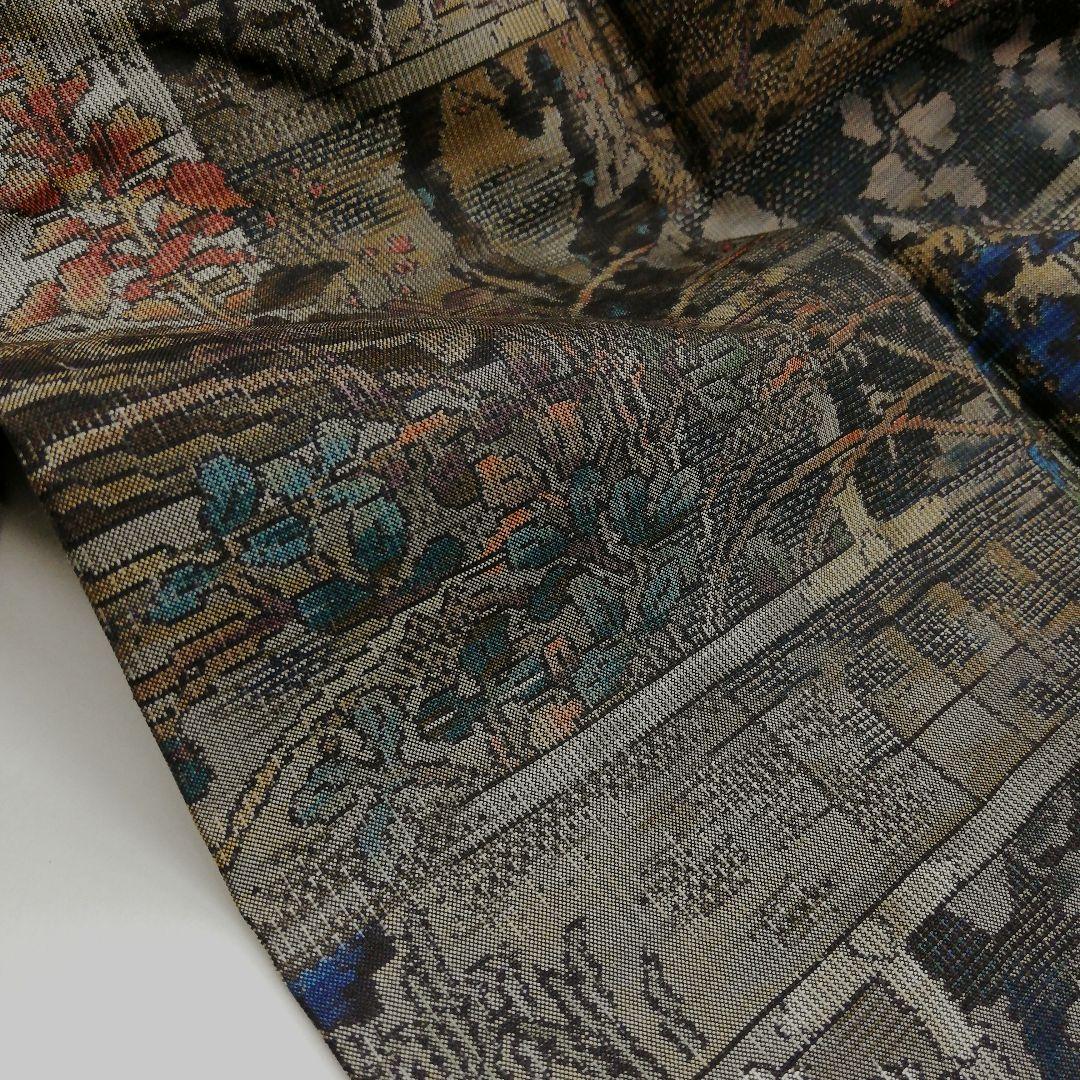 本場大島紬(袷)　(四季の草花紋様　恵 積五郎(絣の魔術師)　裄68㌢身幅広め)