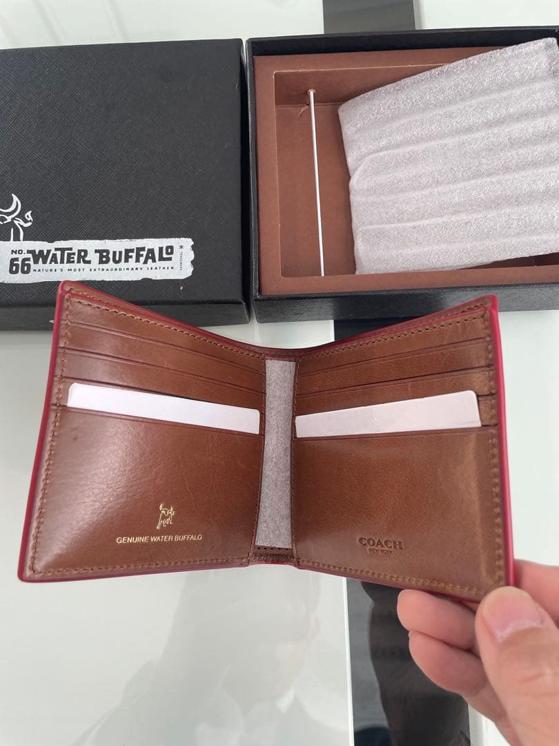 C*y様 ニューイヤーセール‼️ 新品未使用 COACH 水牛革 二つ折り財布