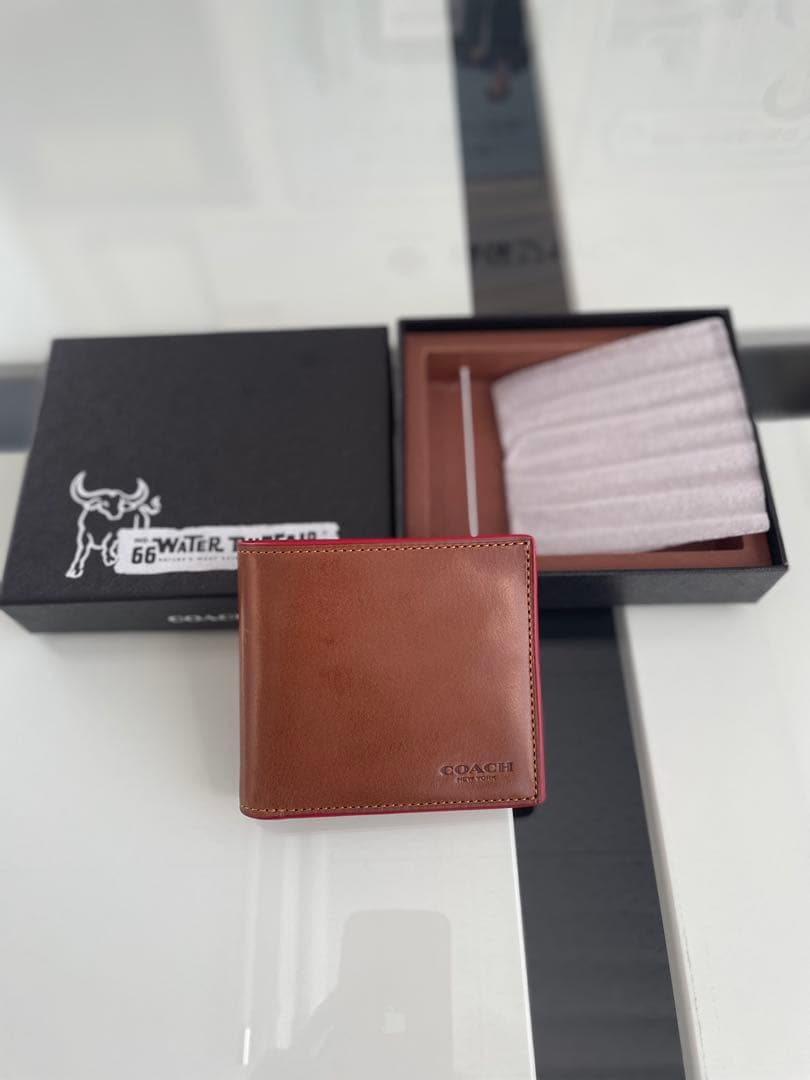 C*y様 ニューイヤーセール‼️ 新品未使用 COACH 水牛革 二つ折り財布