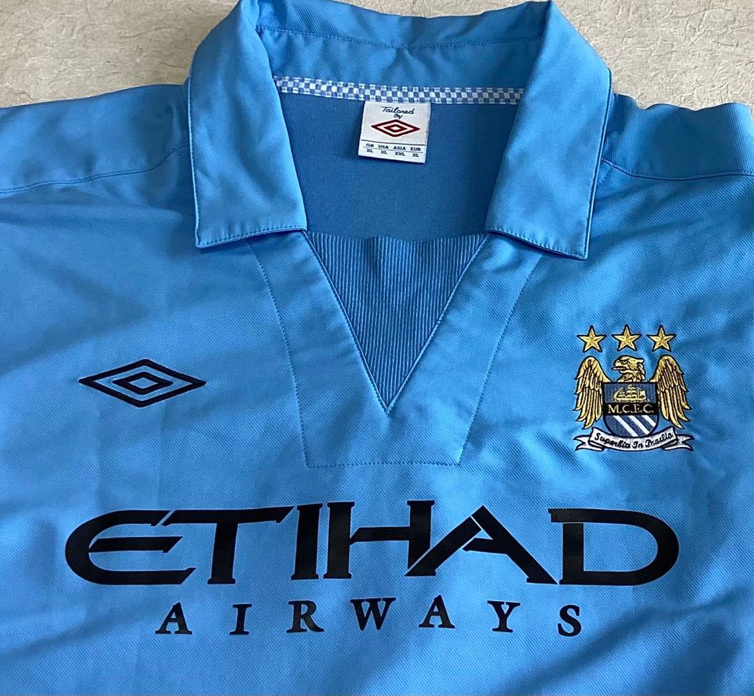 アンブロ　マンチェスターシティ　ドリルトップ　ユニフォーム　オアシス