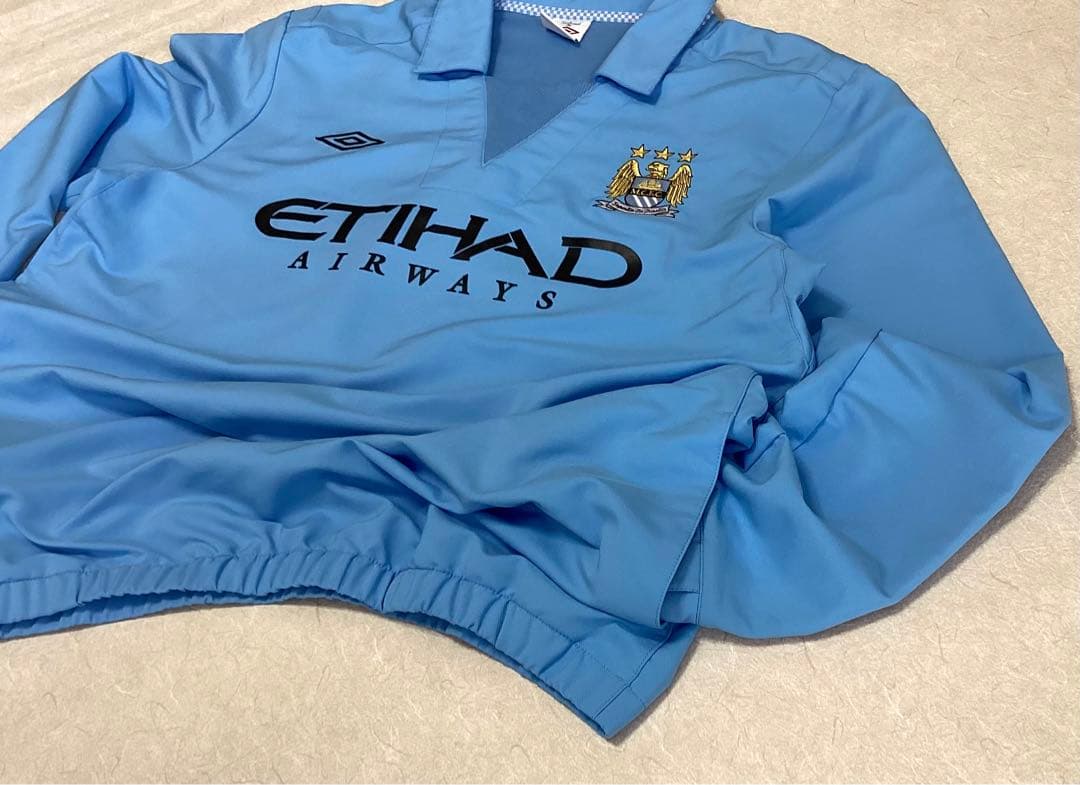 アンブロ　マンチェスターシティ　ドリルトップ　ユニフォーム　オアシス