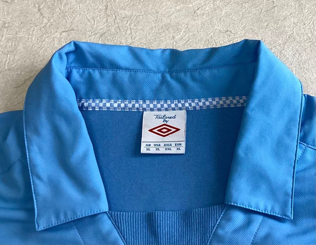 アンブロ　マンチェスターシティ　ドリルトップ　ユニフォーム　オアシス