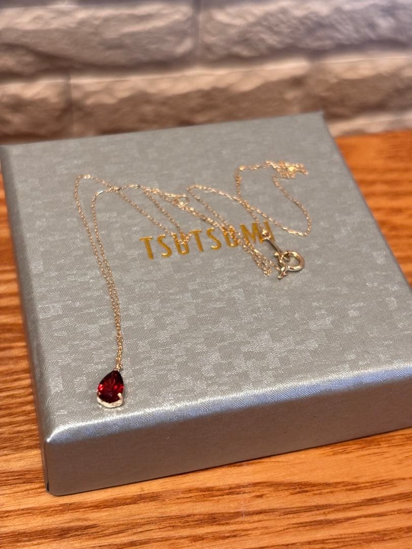 新品TSUTSUMIアルマンダインガーネット雫ネックレス K10イエローゴールド