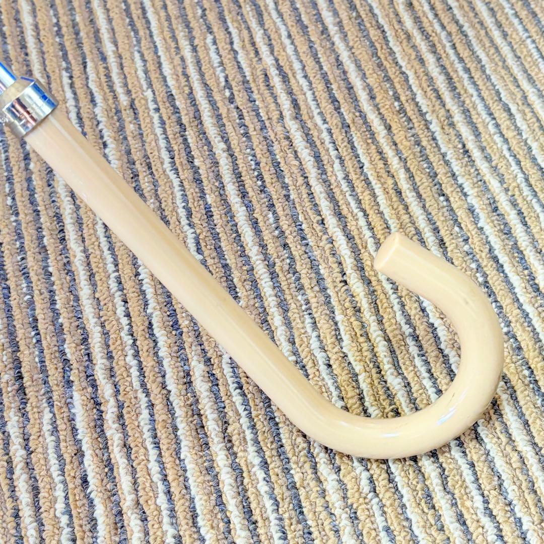 イヴ・サンローラン　YSLロゴ総柄晴雨兼用長傘　メタリックホワイト