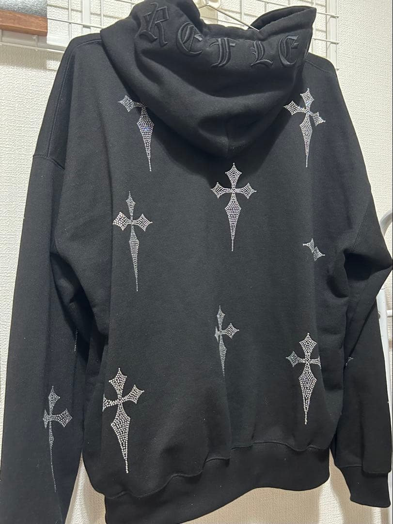 レフレムラインストーンクロス総柄長袖ジップアップパーカー