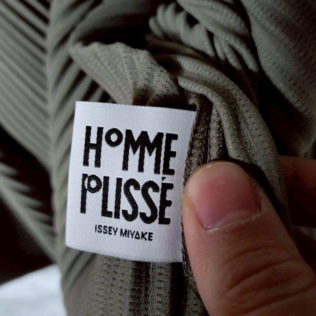 オムプリッセイッセイミヤケ フーディ ポンチョカーディガン マント ミドル丈