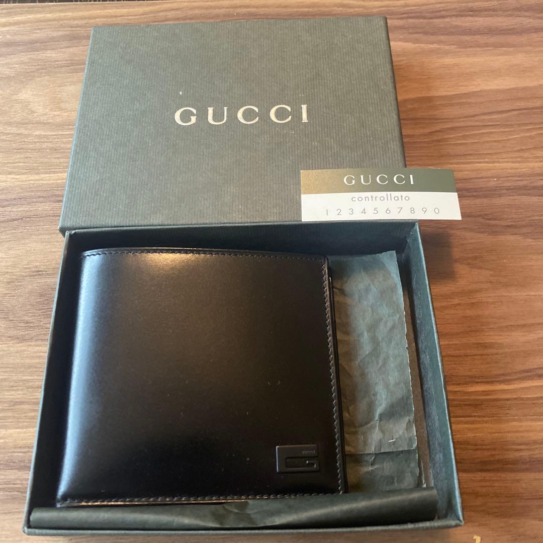 佐*ん様 GUCCI 二つ折り財布 ブラック