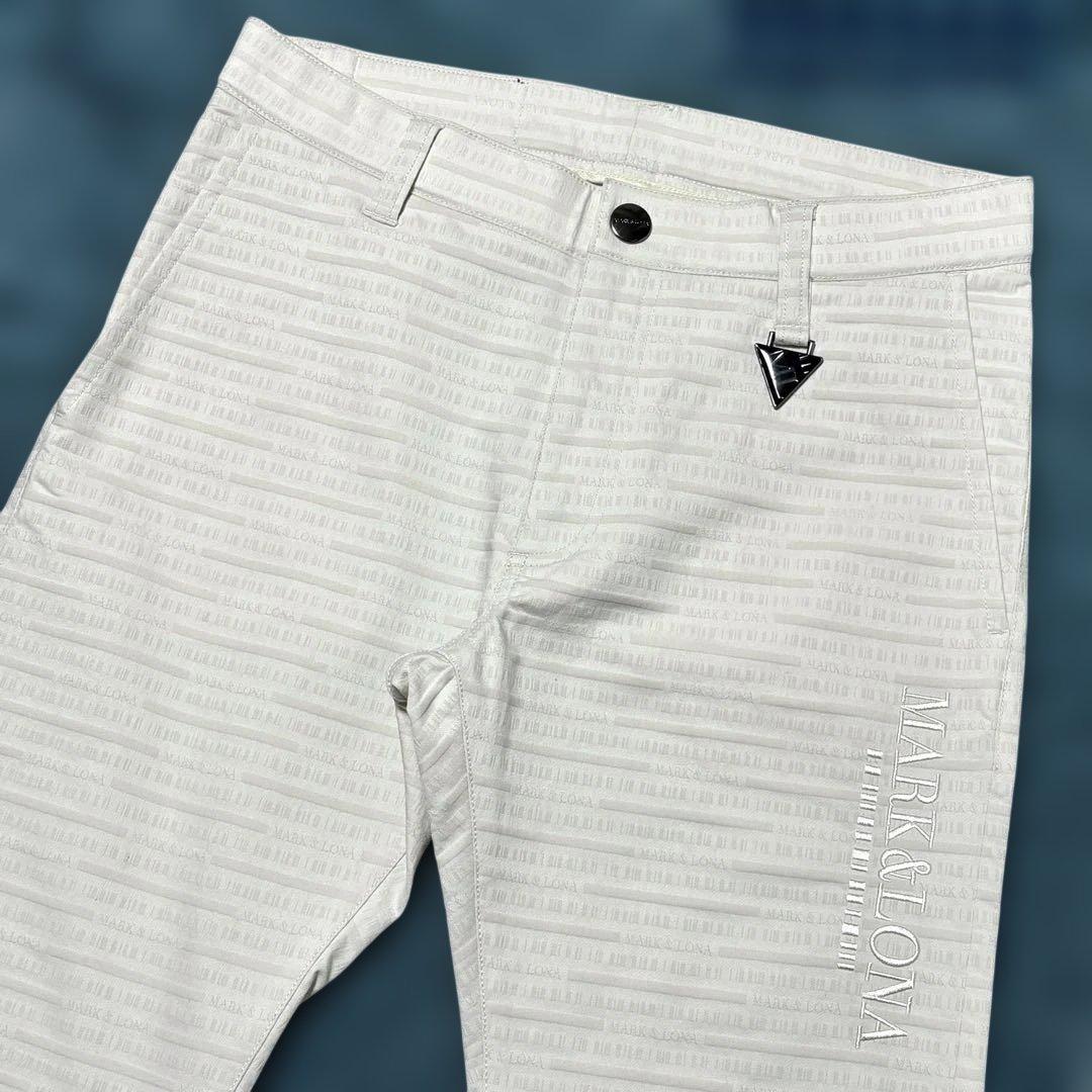 【未使用級】23AW マークアンドロナ ゴルフパンツ ロゴ総柄 ホワイト 44