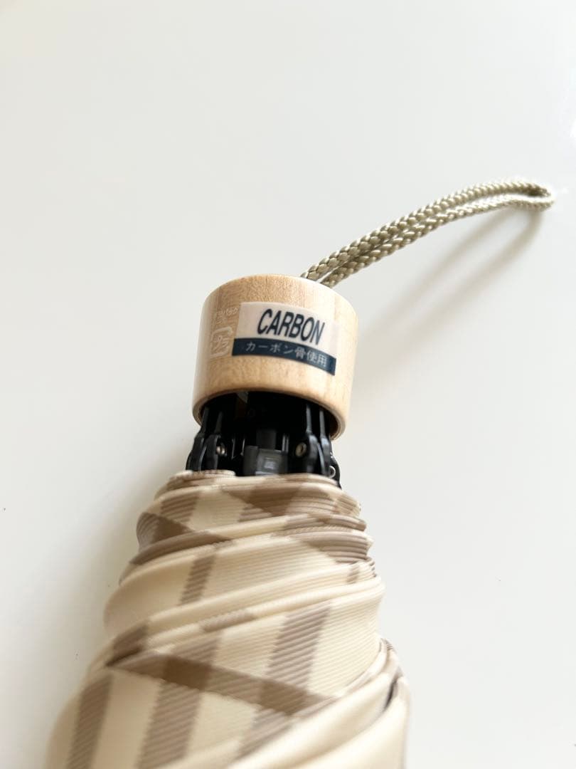 BURBERRY 美品折りたたみ傘 ベージュチェック柄透かしマーク カーボン骨