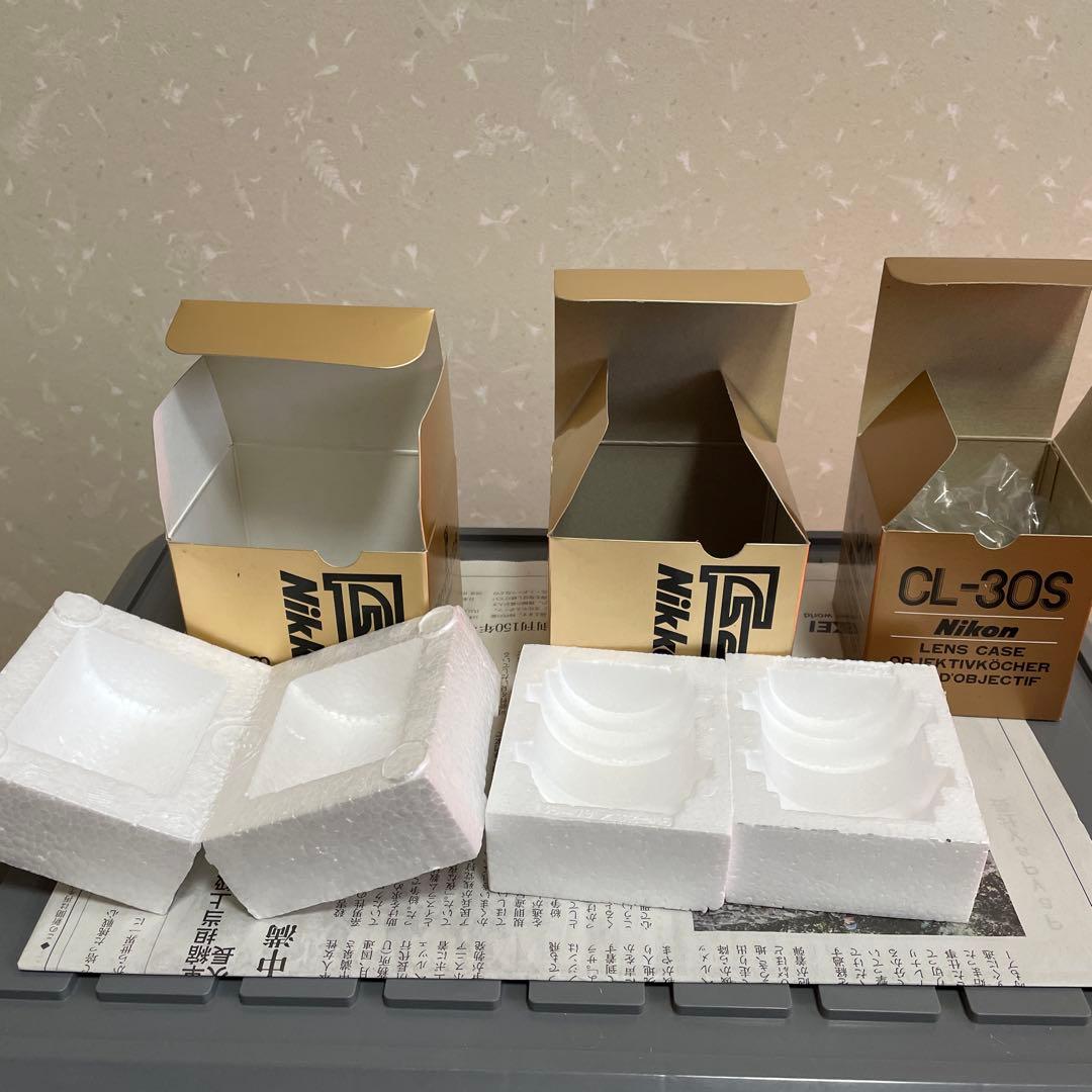 Nikon F3、NEW FM2、レンズ2本、レンズケースの空箱