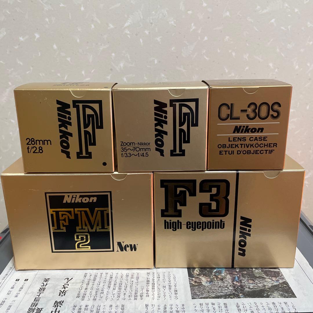 Nikon F3、NEW FM2、レンズ2本、レンズケースの空箱