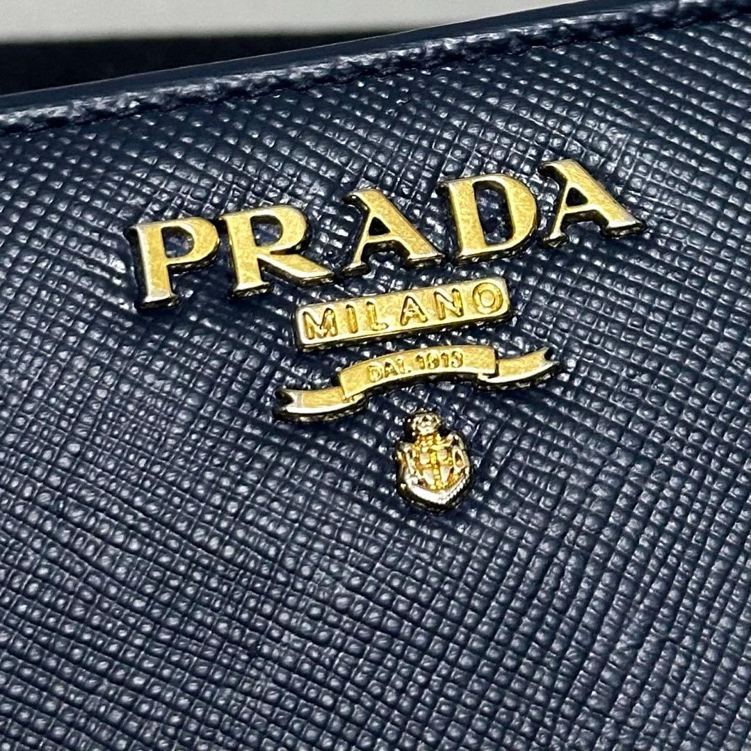PRADA プラダ　折り財布　ラウンドファスナー　ゴールドロゴ　ブルー