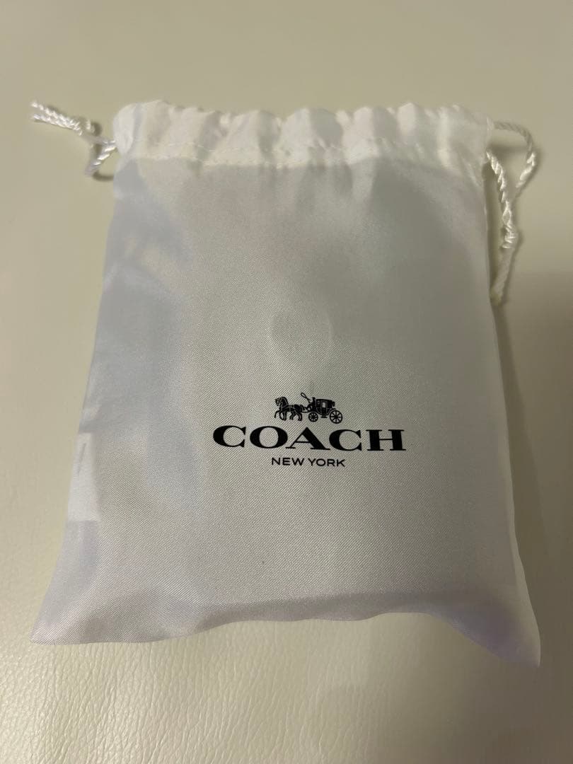 新品 COACH ネイビー 二つ折り財布