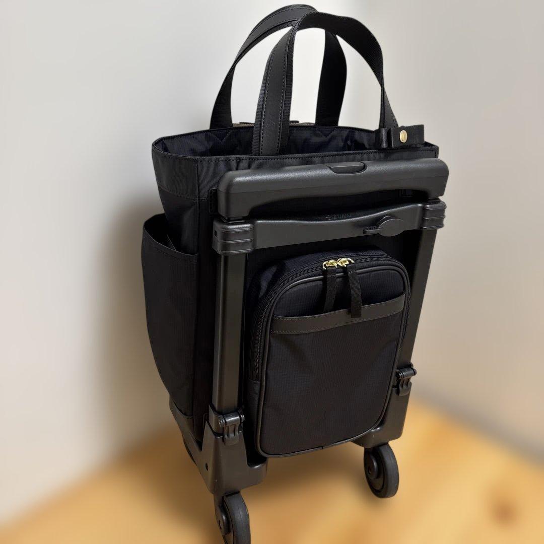 値下げ‼️人気ブランド‼️SWANY‼️スワニー4輪キャリーバック（レインカバー付き）