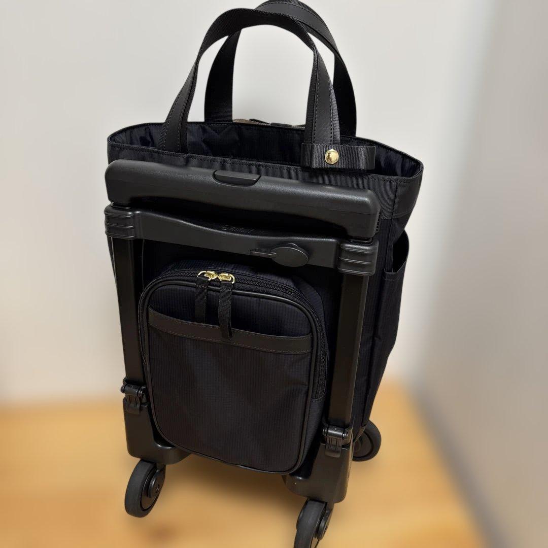 値下げ‼️人気ブランド‼️SWANY‼️スワニー4輪キャリーバック（レインカバー付き）