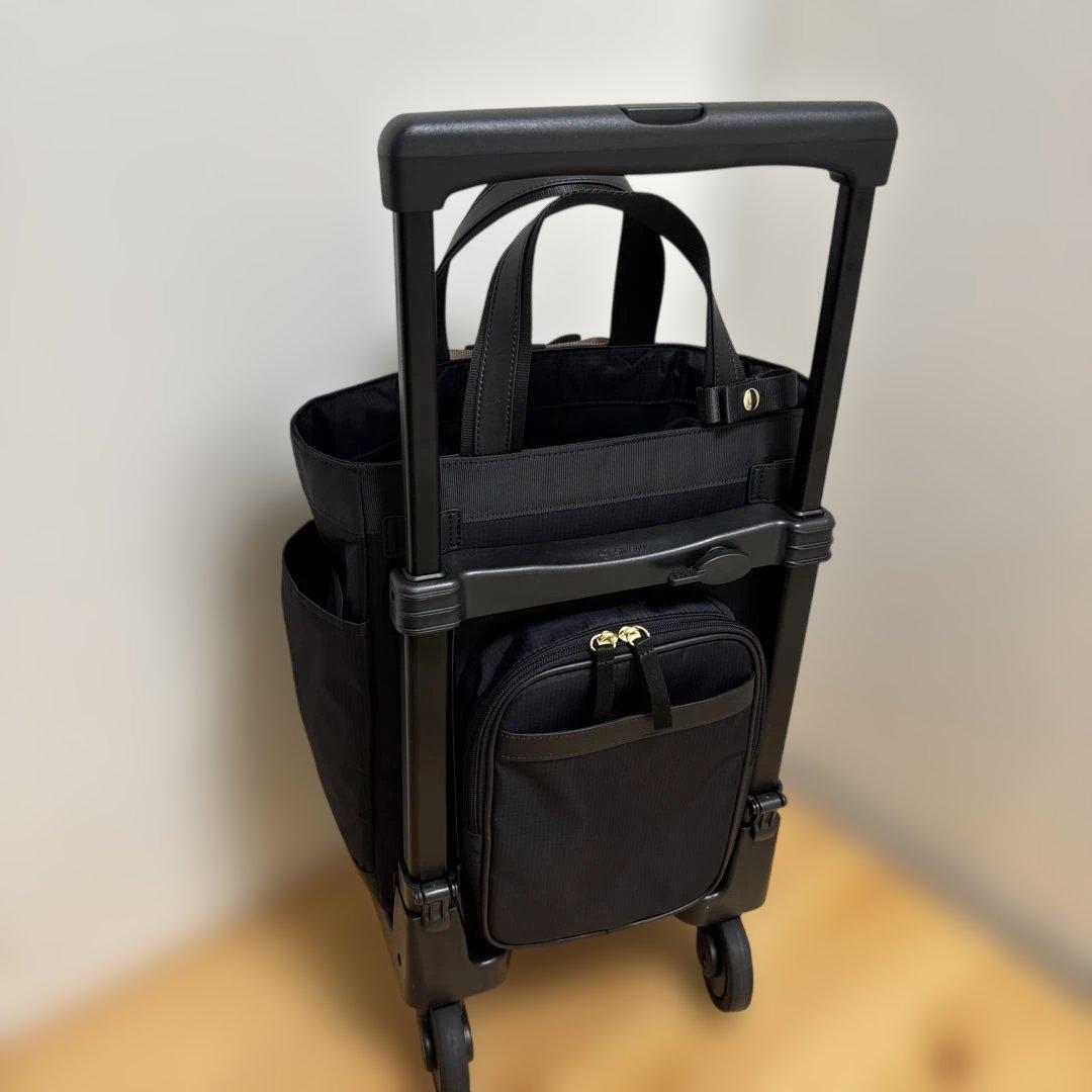 値下げ‼️人気ブランド‼️SWANY‼️スワニー4輪キャリーバック（レインカバー付き）