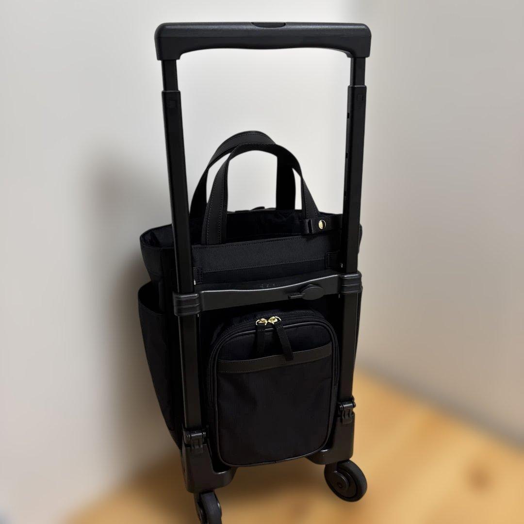 値下げ‼️人気ブランド‼️SWANY‼️スワニー4輪キャリーバック（レインカバー付き）